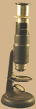 Wollensak 100X Microscope with round foot